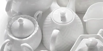 Порцелянові чайники, кавники і молочники